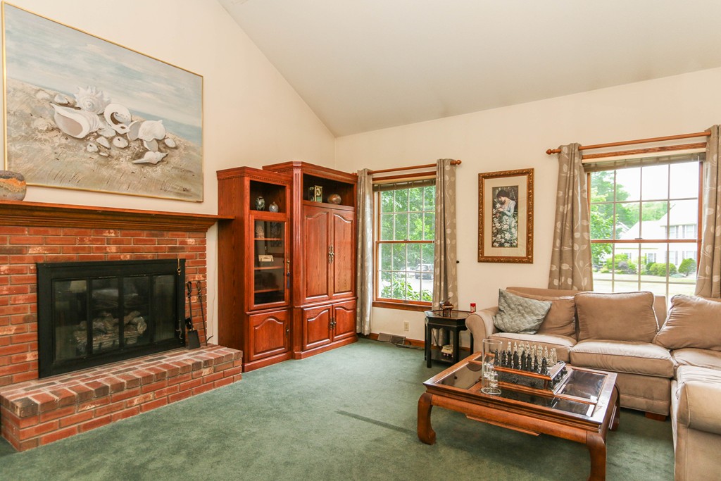12 Bellows Road Wilbraham, MA 01095 - Photo 17 of 30 a living room with furniture and a fireplace