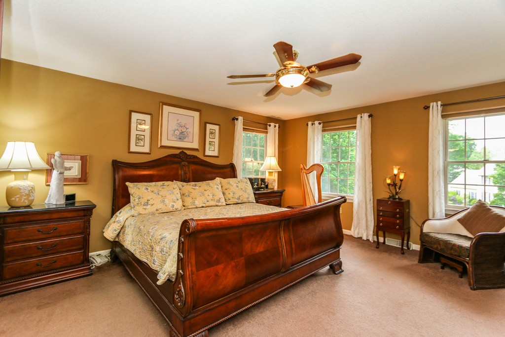 12 Bellows Road Wilbraham, MA 01095 - Photo 20 of 30 a bedroom with a bed and ceiling fan