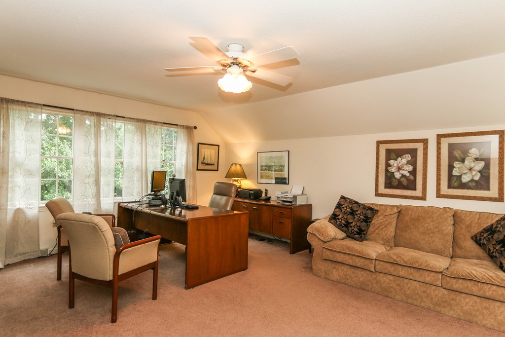12 Bellows Road Wilbraham, MA 01095 - Photo 24 of 30 a living room with furniture kitchen area and a large window