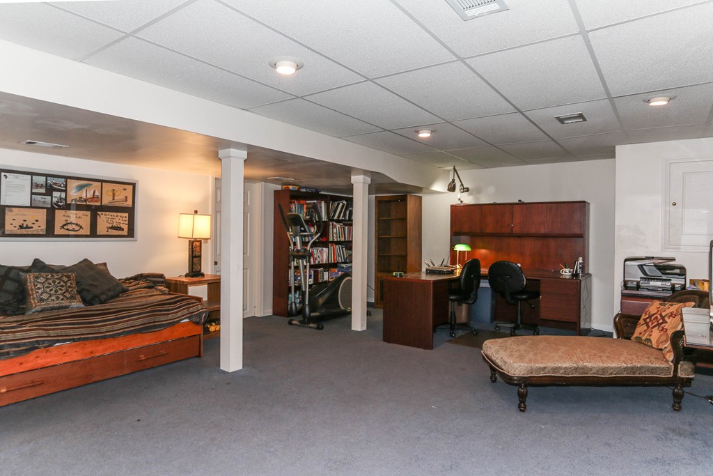 12 Bellows Road Wilbraham, MA 01095 - Photo 26 of 30 a living room with furniture and a flat screen tv