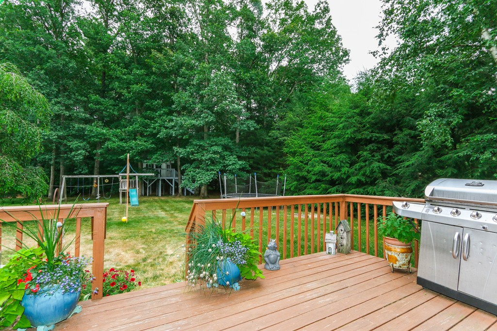 12 Bellows Road Wilbraham, MA 01095 - Photo 28 of 30 a view of a backyard with a wooden deck