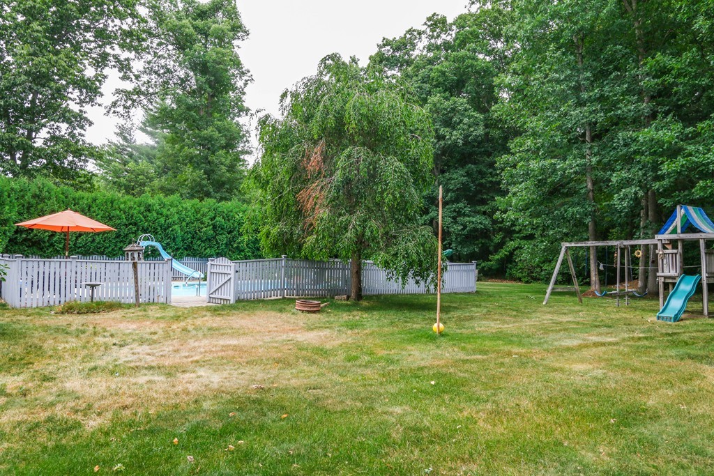 12 Bellows Road Wilbraham, MA 01095 - Photo 29 of 30 a swimming pool with lots of tress in front of it