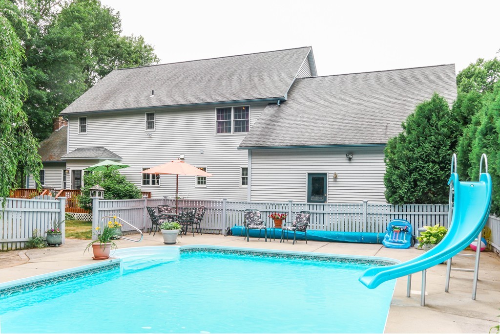 12 Bellows Road Wilbraham, MA 01095 - Photo 30 of 30 a view of a house with pool and chairs