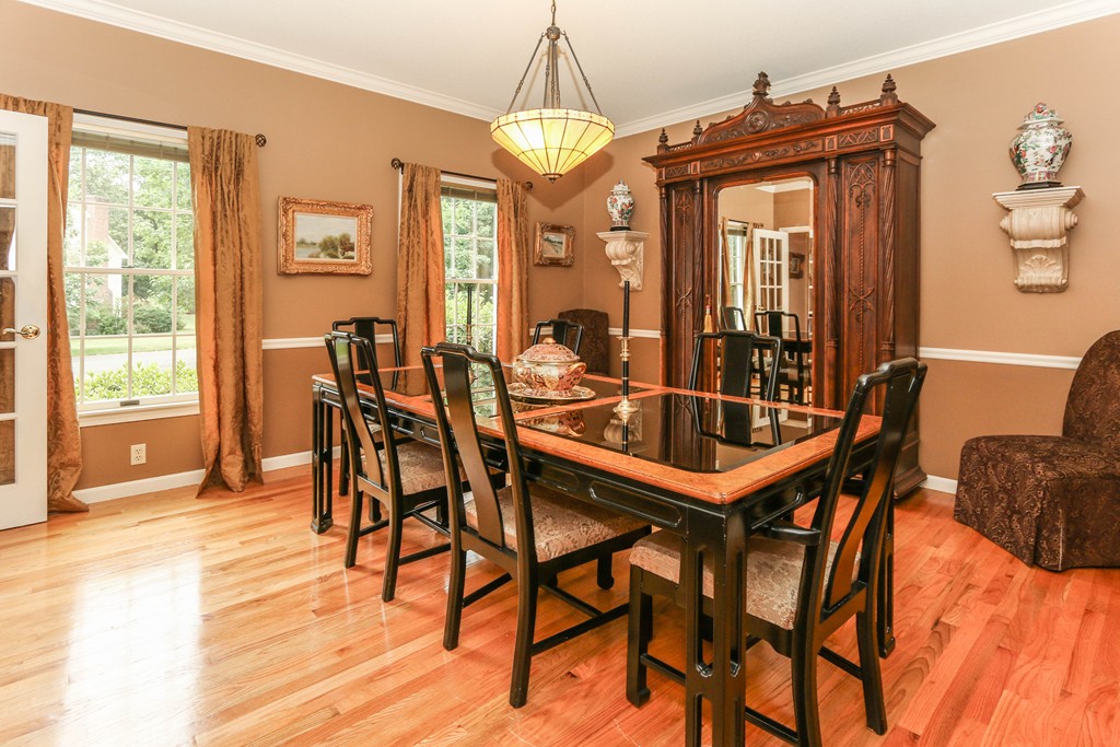 12 Bellows Road Wilbraham, MA 01095 - Photo 7 of 30 a dining room with furniture a chandelier and wooden floor