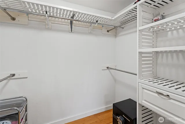 a view of a room with racks on the wall
