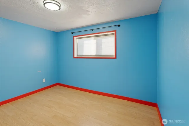 a view of a room with a window