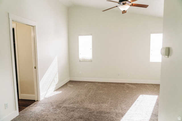 1825 West Mathis Park Place, Unit 40 St. George, UT 84770 - Photo 17 of 28 Spare room featuring lofted ceiling, carpet floors, and ceiling fan