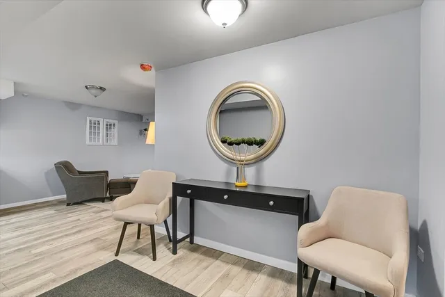 a bathroom with a sink double vanity granite and a mirror