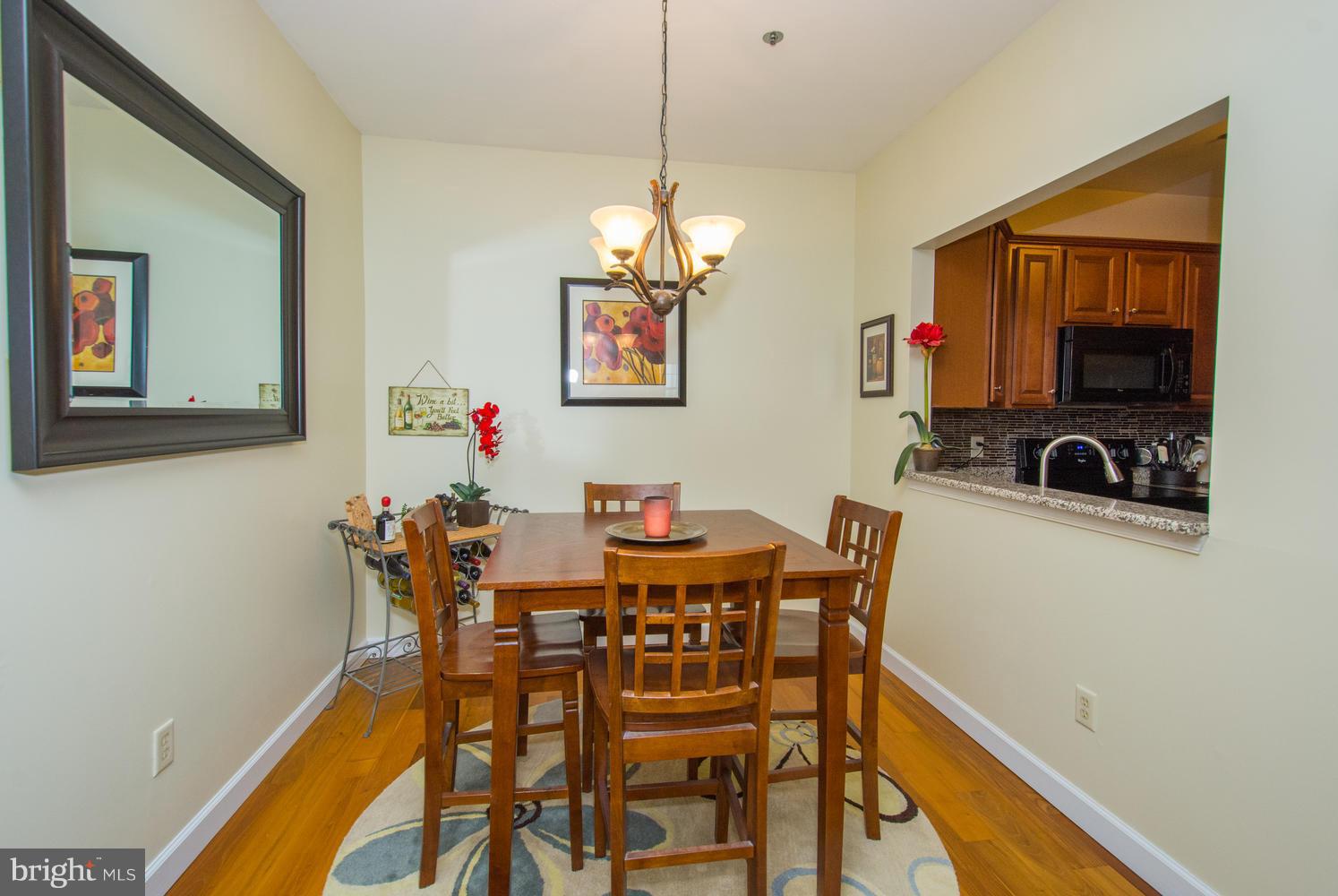 606 Moonglow Road, Unit 203 Odenton, MD 21113 - Photo 11 of 29 a dining room with furniture and window