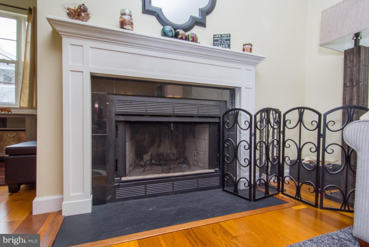 606 Moonglow Road, Unit 203 Odenton, MD 21113 - Photo 9 of 29 a living room with furniture and a fireplace
