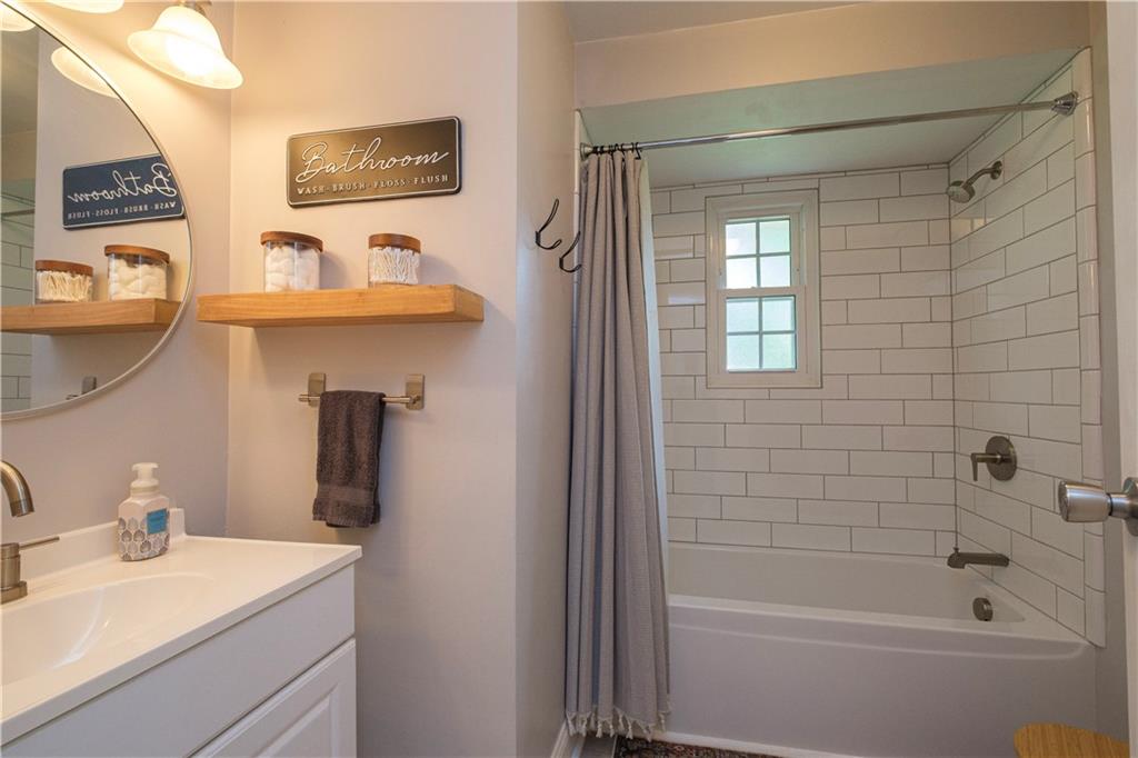 137 Easley Road Pittsburgh, PA 15237 - Photo 16 of 25 a bathroom with a sink a toilet and shower