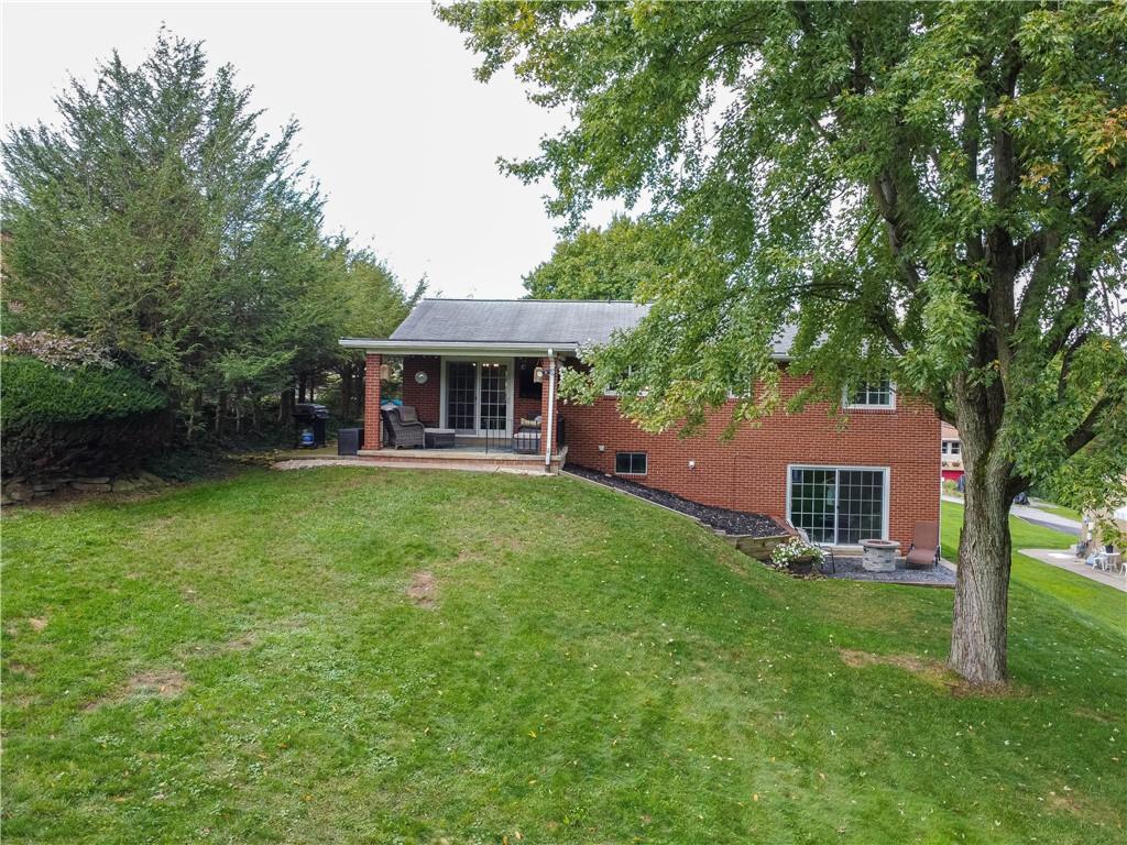 137 Easley Road Pittsburgh, PA 15237 - Photo 24 of 25 a front view of a house with garden