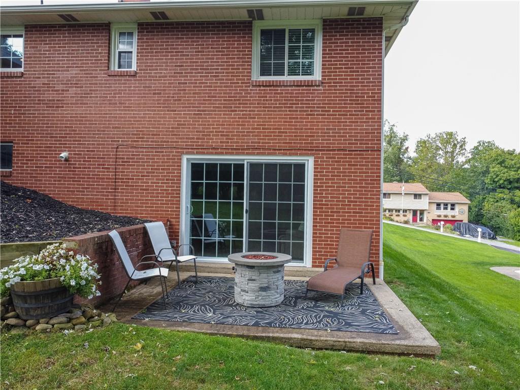 137 Easley Road Pittsburgh, PA 15237 - Photo 25 of 25 a view of a house with backyard and porch