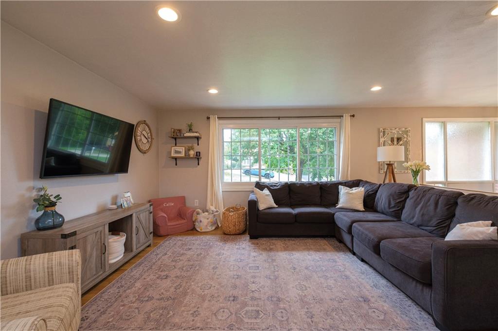 137 Easley Road Pittsburgh, PA 15237 - Photo 3 of 25 a living room with furniture and a flat screen tv