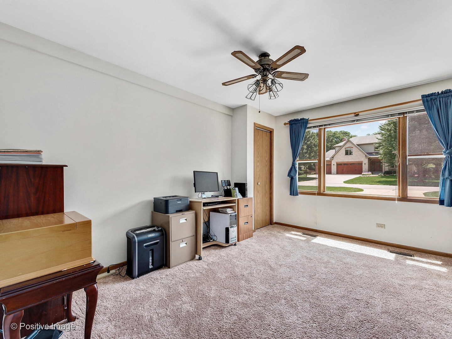 521 Ranch Road Wheaton, IL 60187 - Photo 16 of 22 a living room with stainless steel appliances furniture and a window
