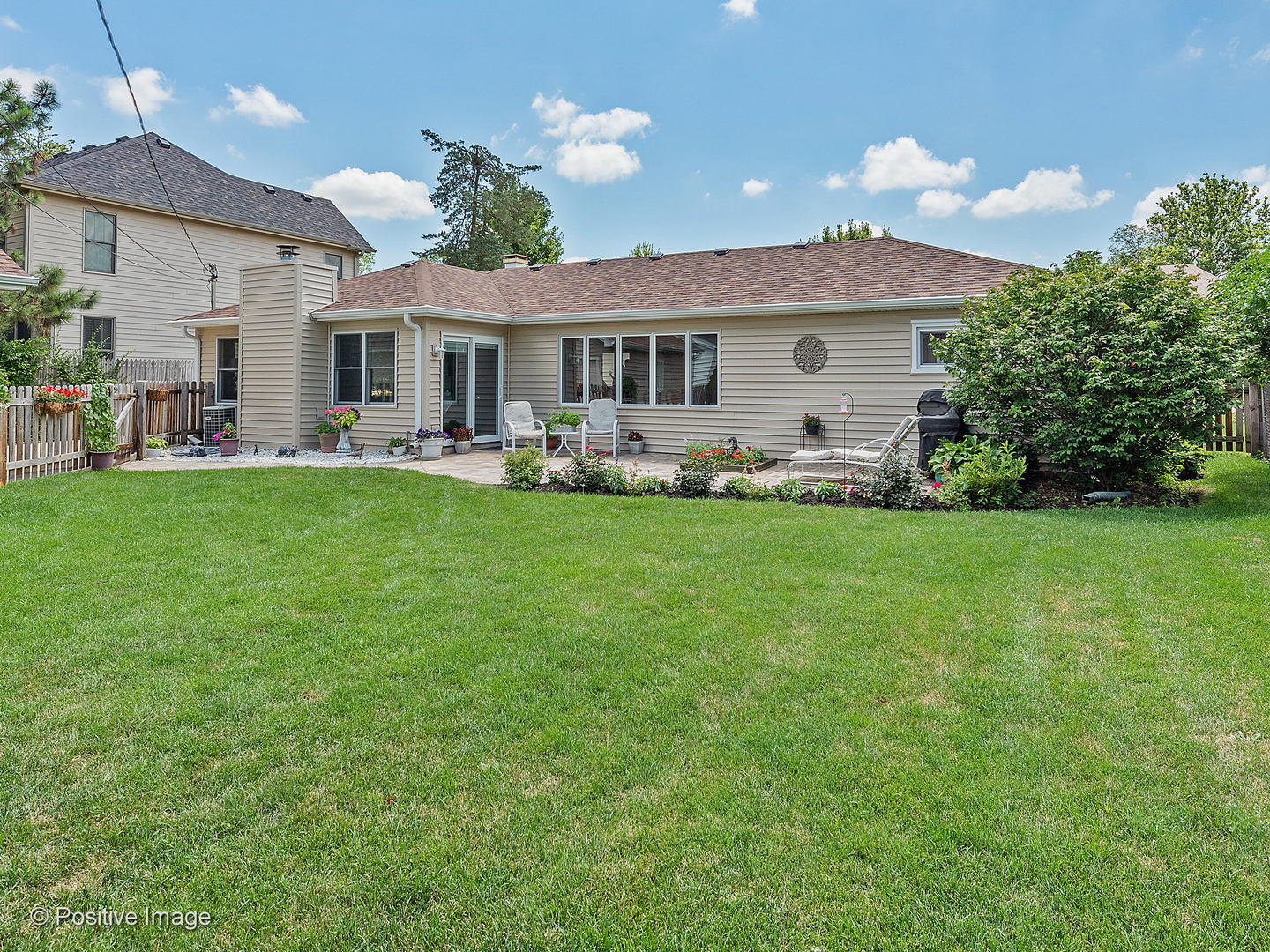521 Ranch Road Wheaton, IL 60187 - Photo 19 of 22 a front view of house with yard and outdoor seating
