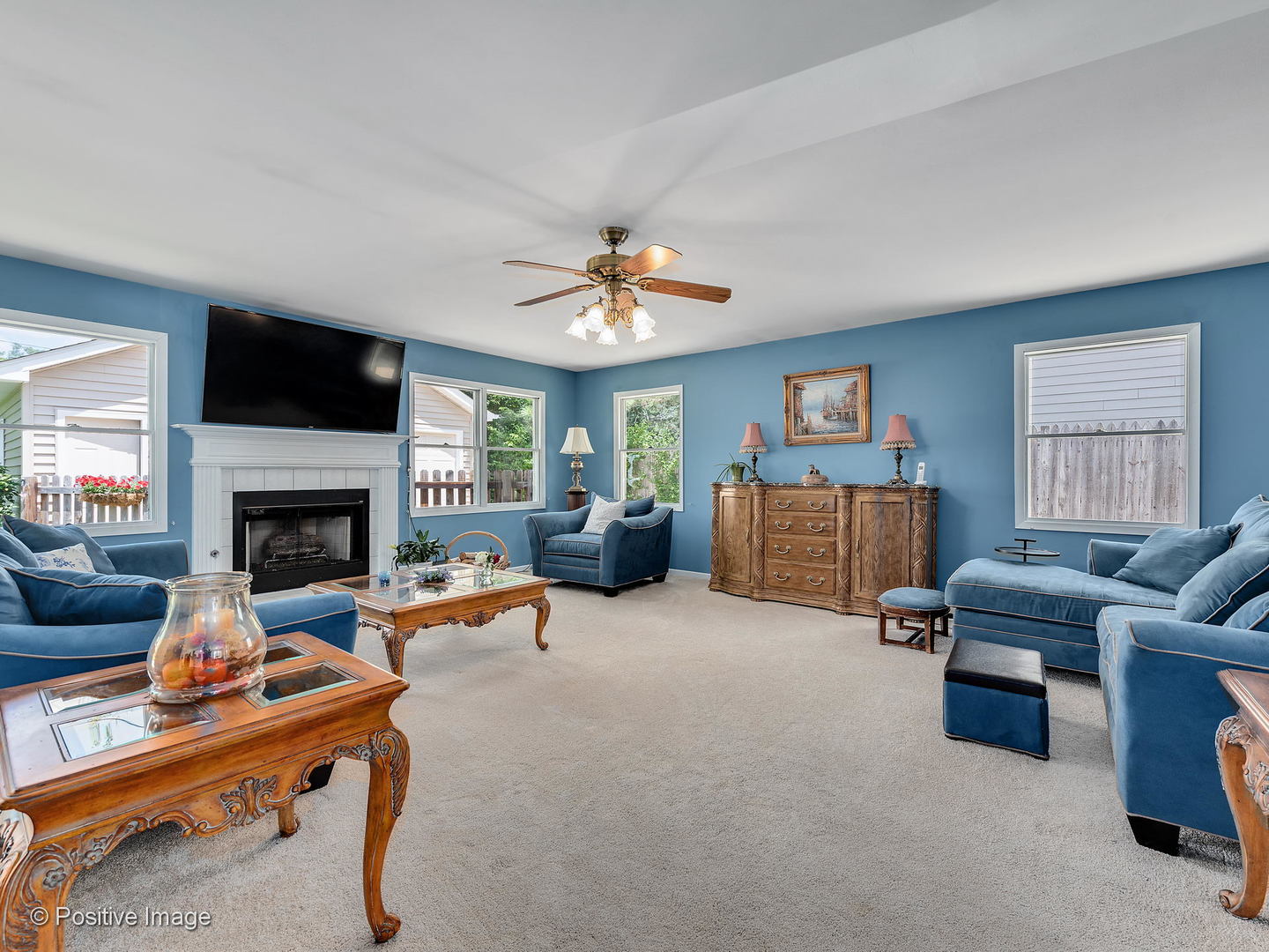 521 Ranch Road Wheaton, IL 60187 - Photo 4 of 22 a living room with furniture and a fireplace