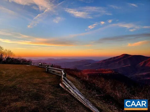 a view of a lake and mountain