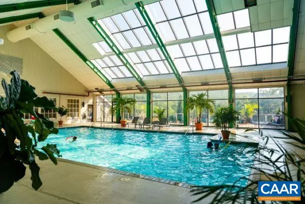 a view of a swimming pool with a slide