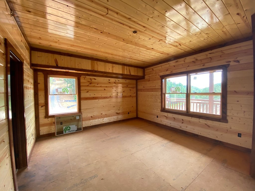 682 Owens Rdg Way Sevierville, TN 37876 - Photo 5 of 23 a view of an empty room with a window