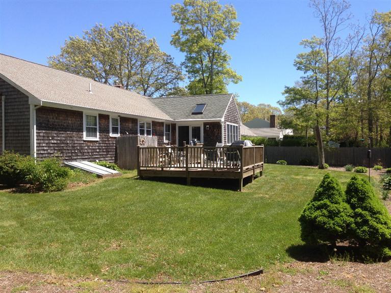 27 Golf Course Road East Dennis, MA 02660 - Photo 2 of 16 a view of house with yard and entertaining space