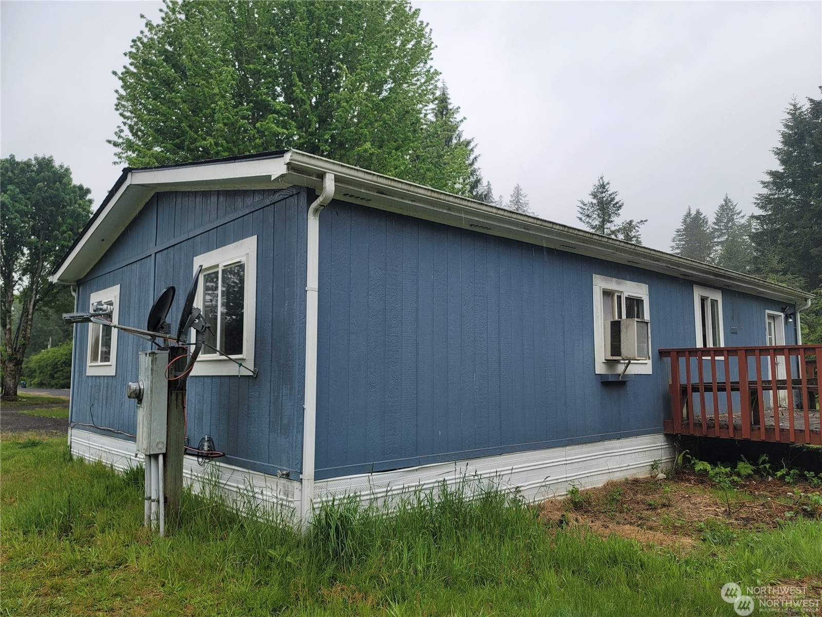 120 Wennassee Loop Silver Creek, WA 98585 - Photo 19 of 23 a backyard of a house with lots of green space