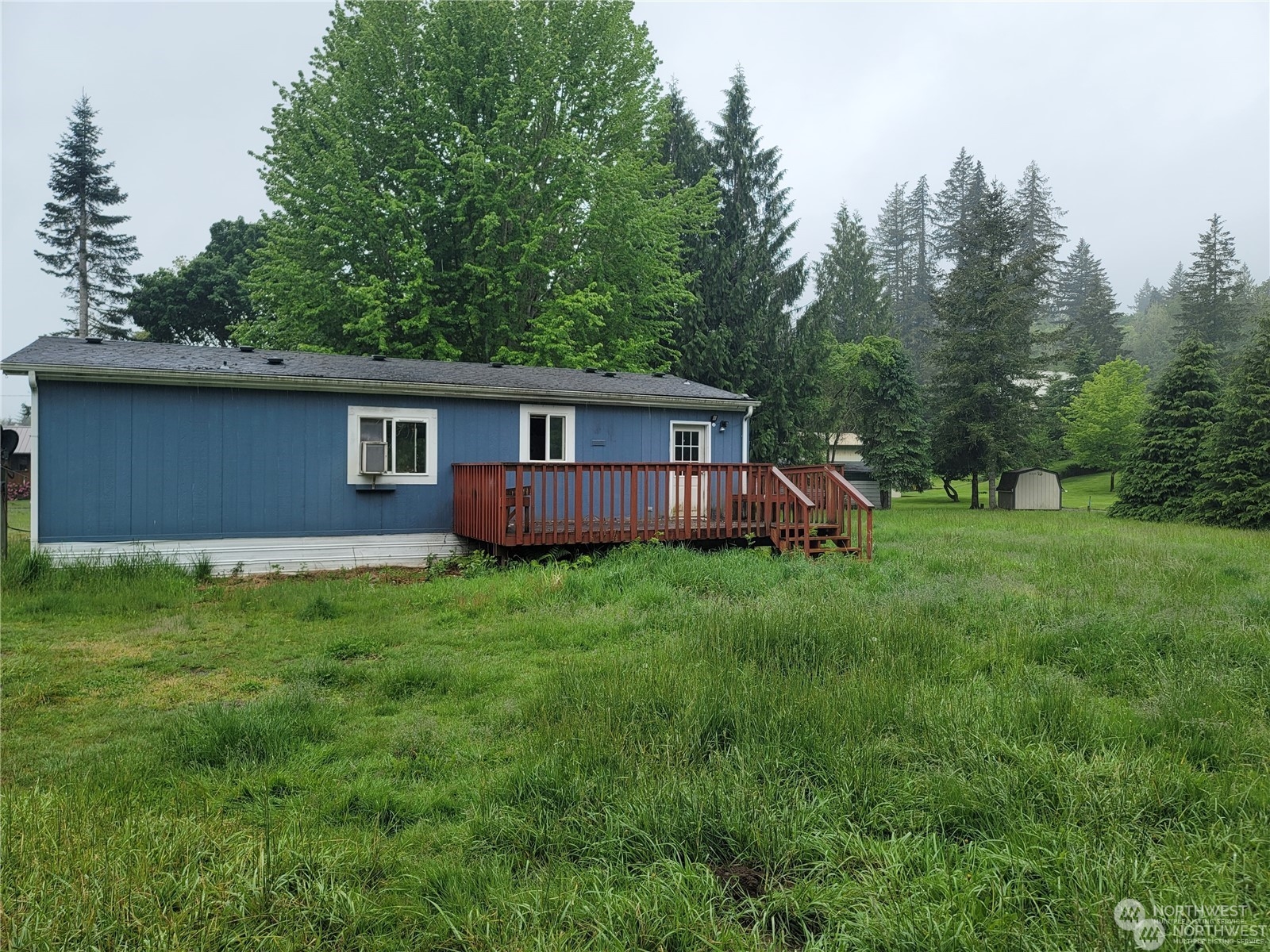 120 Wennassee Loop Silver Creek, WA 98585 - Photo 22 of 23 a view of a house with backyard and garden