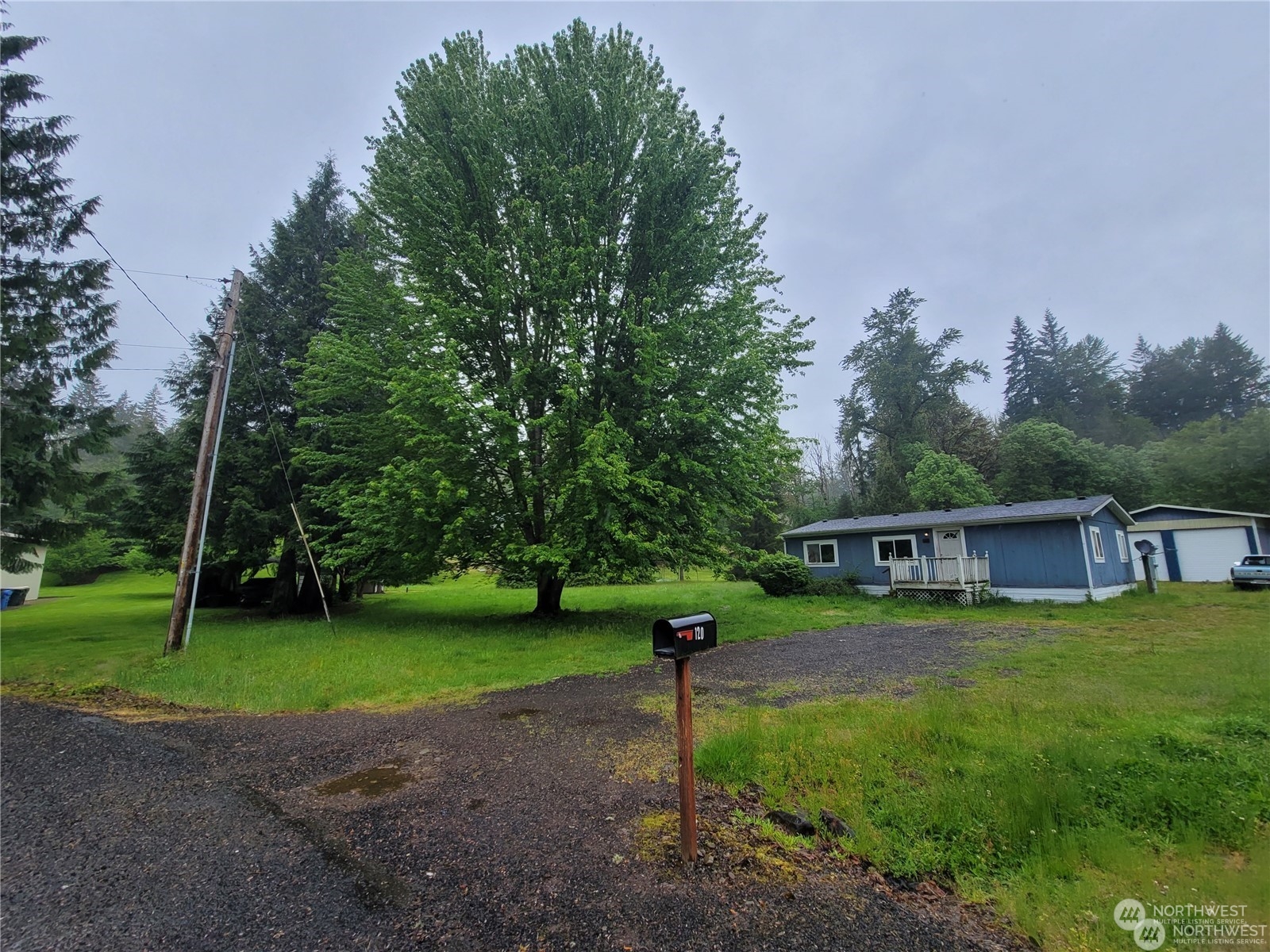 120 Wennassee Loop Silver Creek, WA 98585 - Photo 3 of 23 a view of a house with a yard