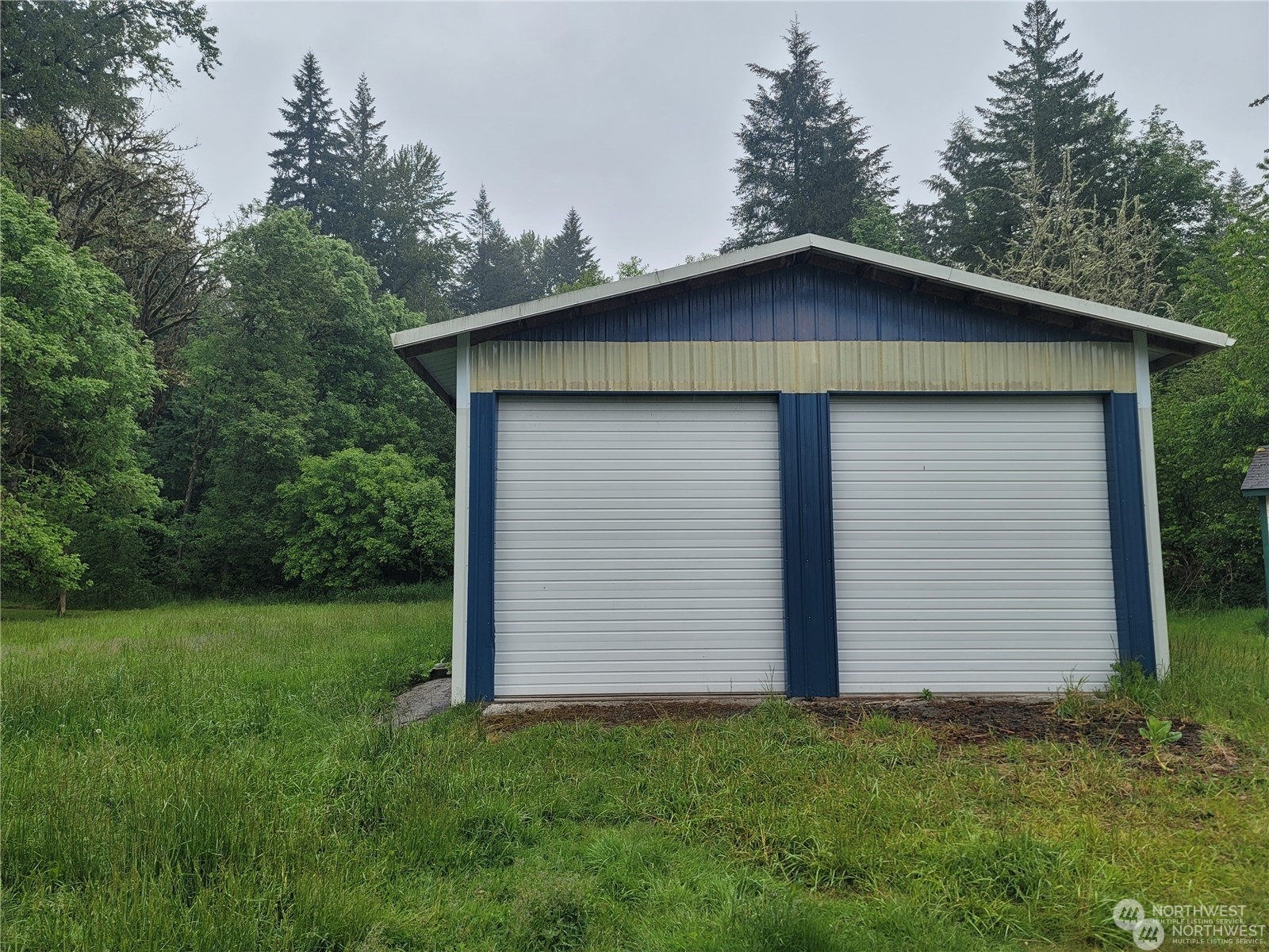 120 Wennassee Loop Silver Creek, WA 98585 - Photo 5 of 23 a house with green space