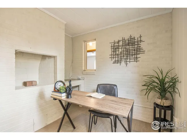 a table that has a table and chair in it