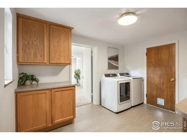 a kitchen with a stove and a microwave