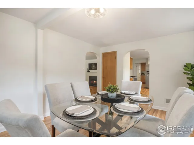 a bathroom with a toilet a sink and a mirror