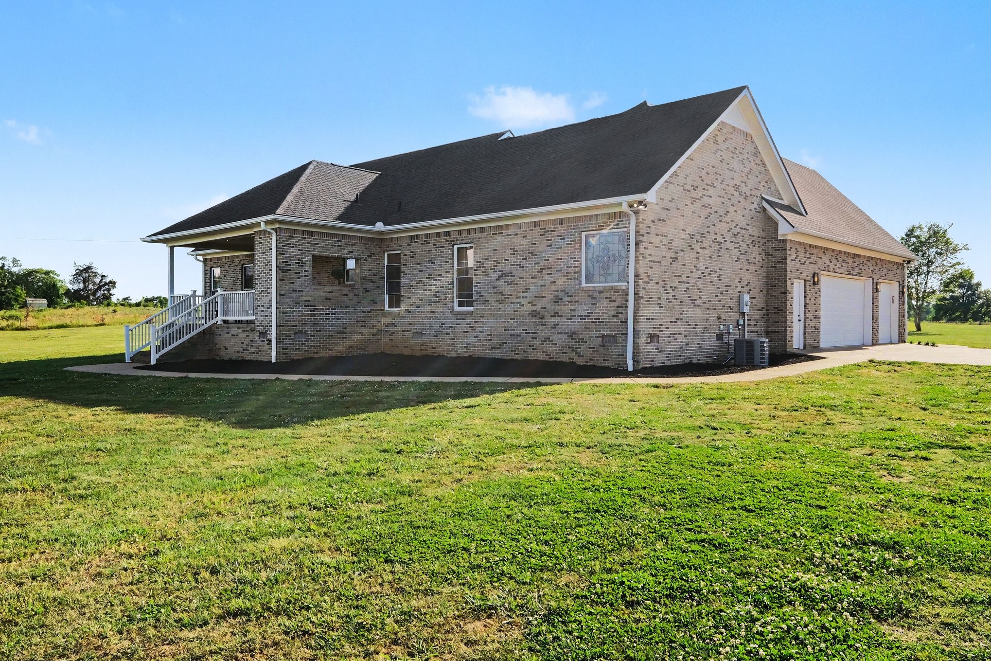 2829 Anes Station Road Lewisburg, TN 37091 - Photo 37 of 43 a view of a house with a yard