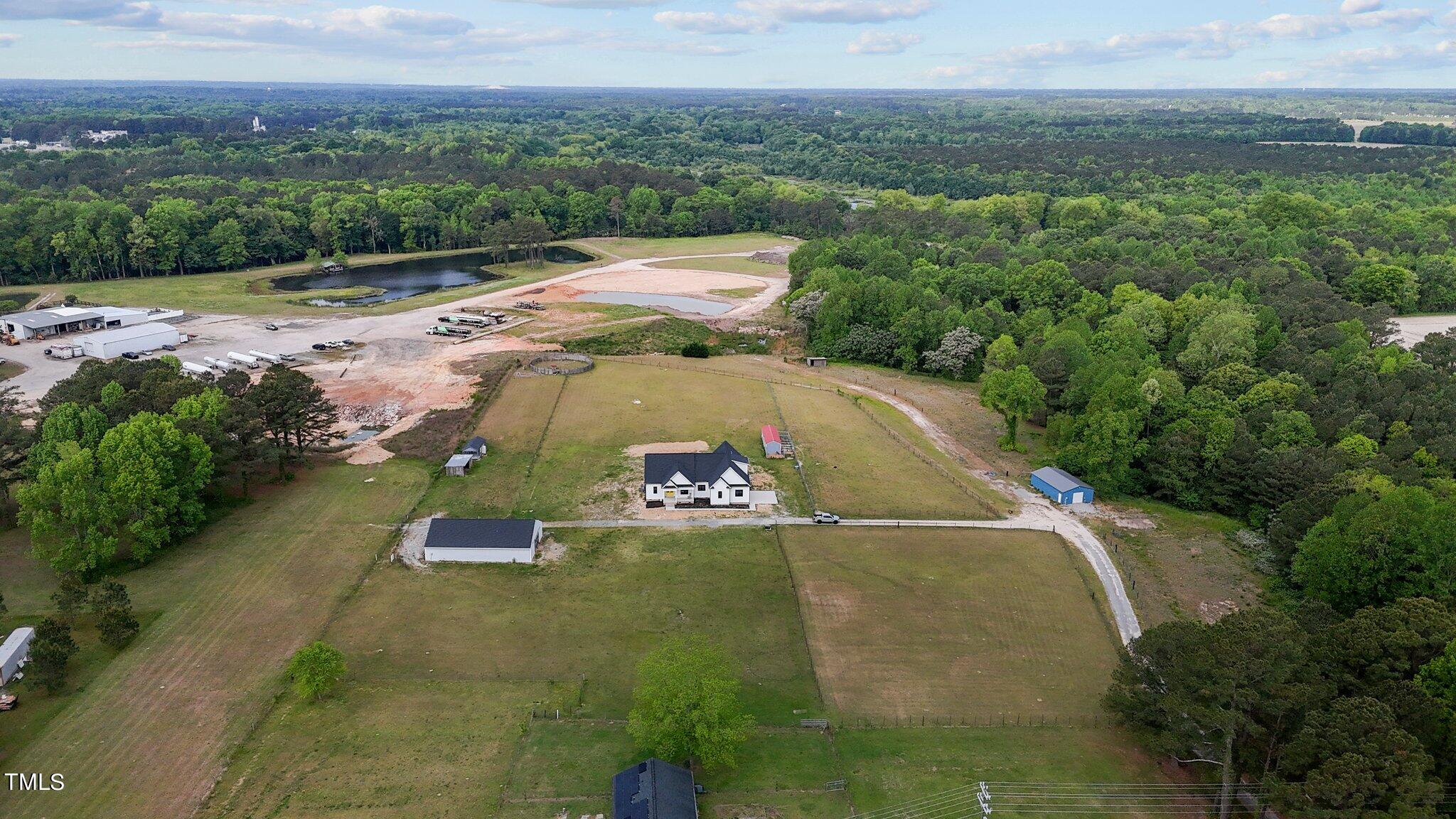 4975 Buffalo Road Selma, NC 27576 - Photo 6 of 53 4-web-or-mls-DJI_20240324010440_0068_D