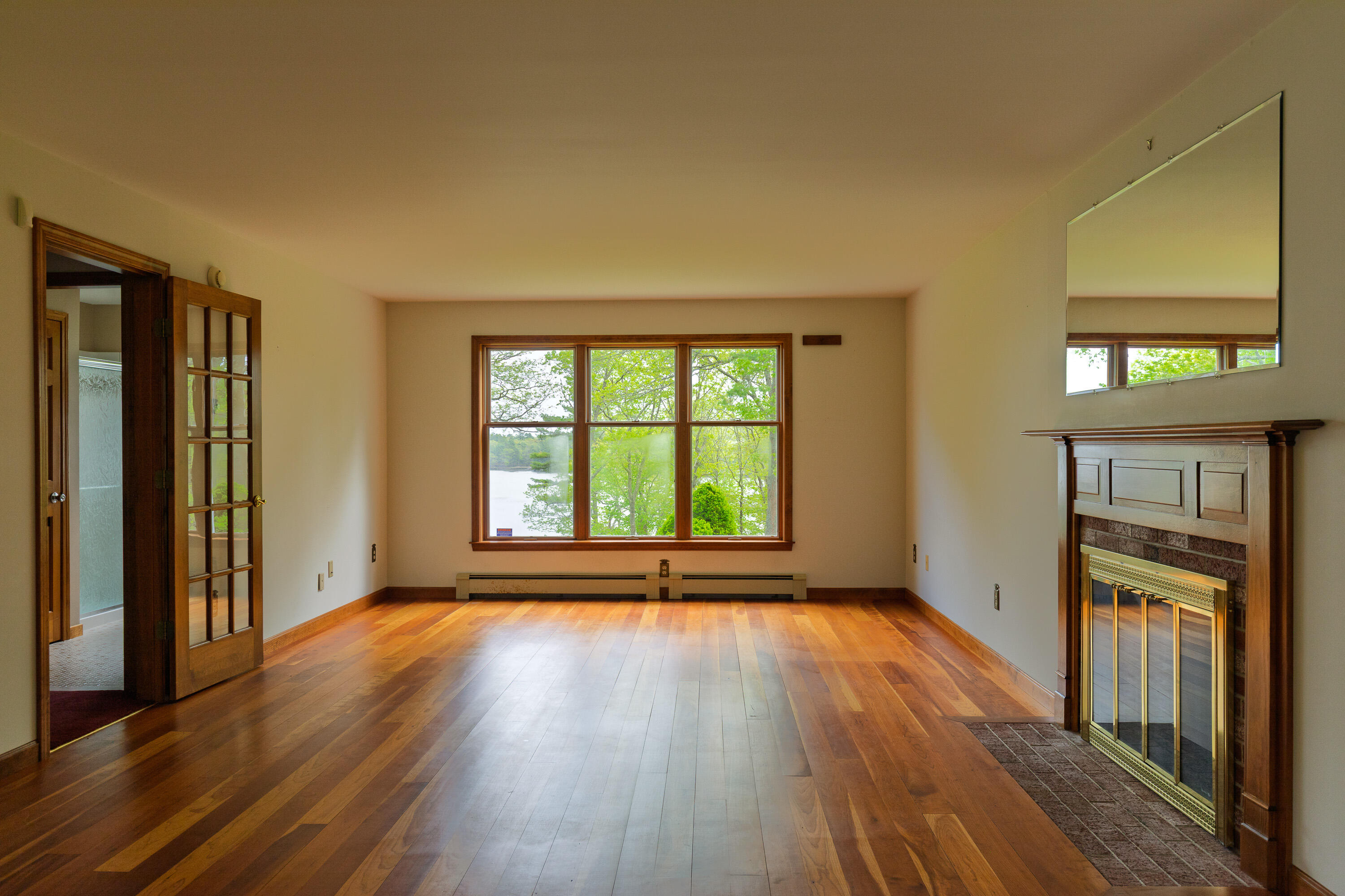 213 Fiddlers Reach Road Phippsburg, ME 04562 - Photo 27 of 45 Living room with cherry wood floors
