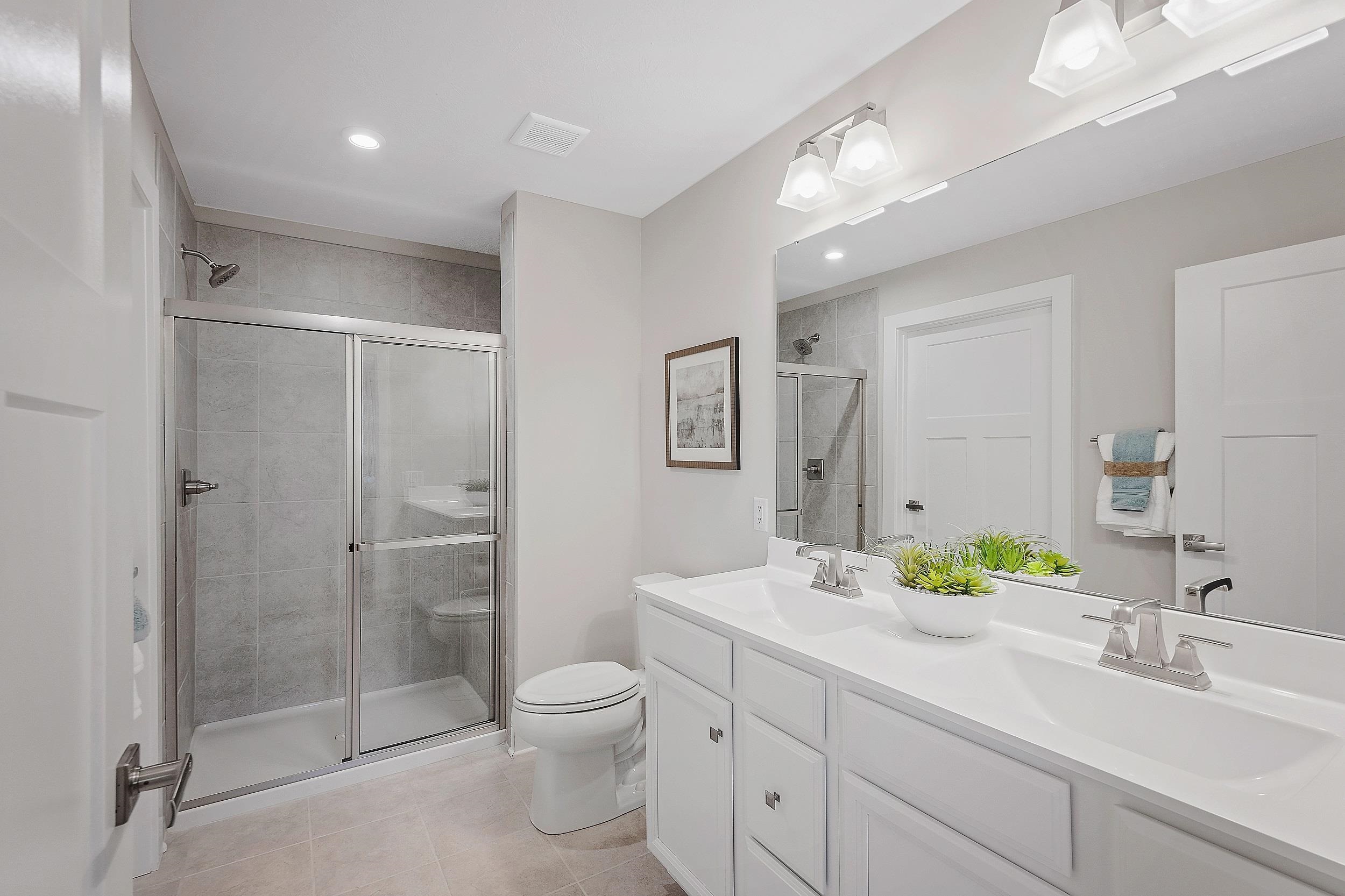 3770 Mayfield Road Mount Crawford, VA 22841 - Photo 10 of 13 a bathroom with a shower sink vanity mirror and toilet