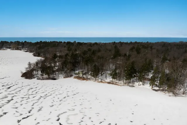 $990,000 | 63 East Piney Road, Manistee, MI 49660