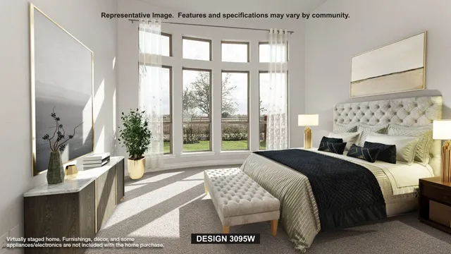 a bedroom with a bed couch and a large window