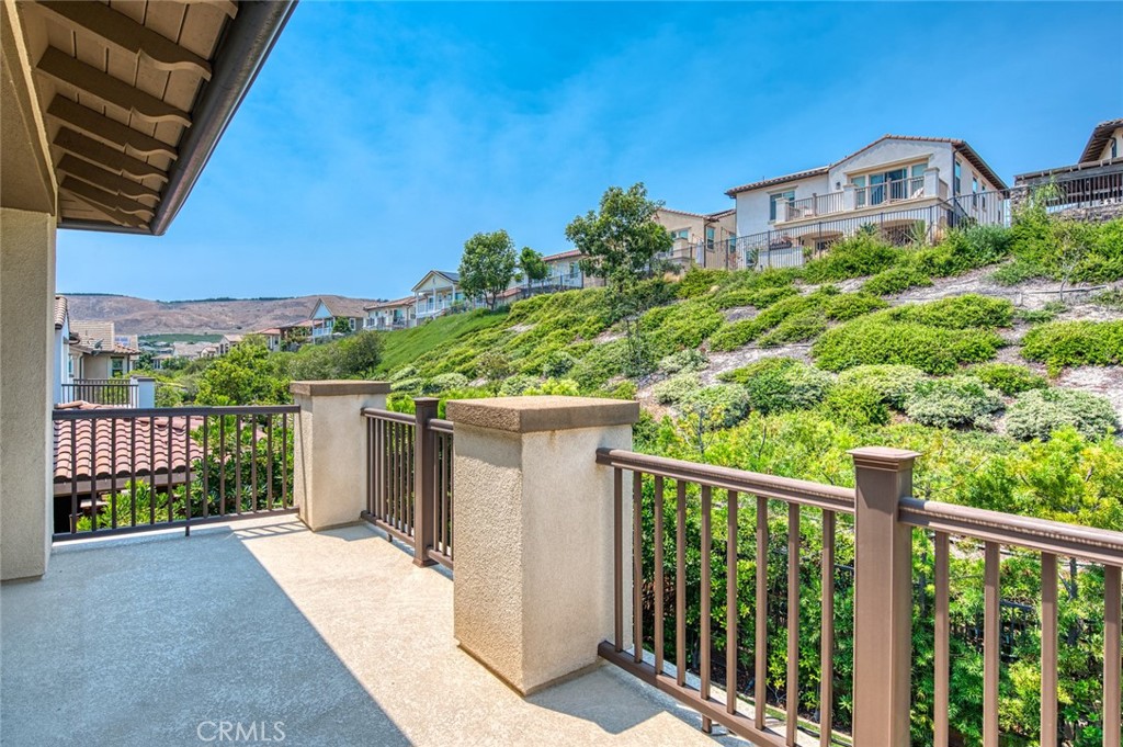33 Lucido Street Rancho Mission Viejo, CA 92694 - Photo 21 of 37 a front view of a house with a yard