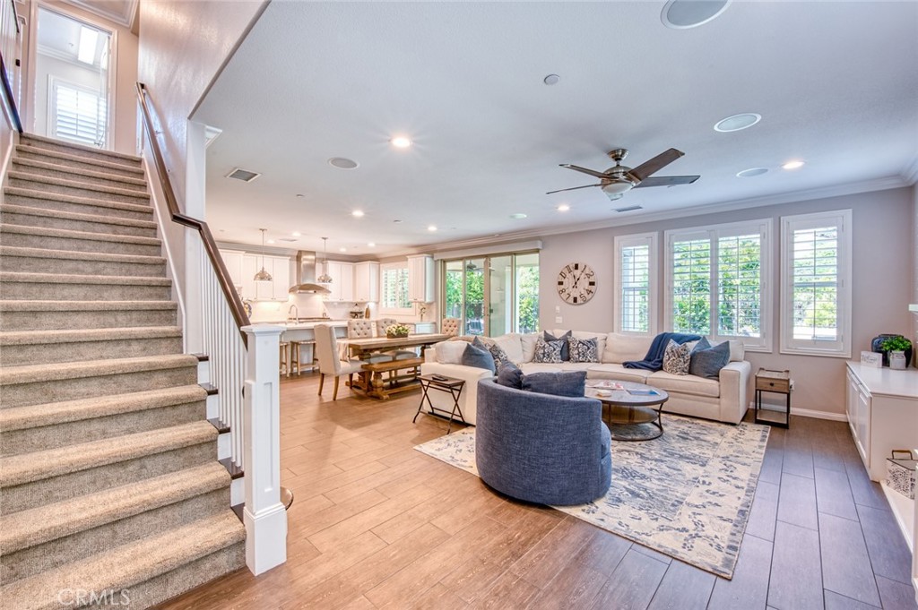 33 Lucido Street Rancho Mission Viejo, CA 92694 - Photo 4 of 37 a living room with furniture and wooden floor