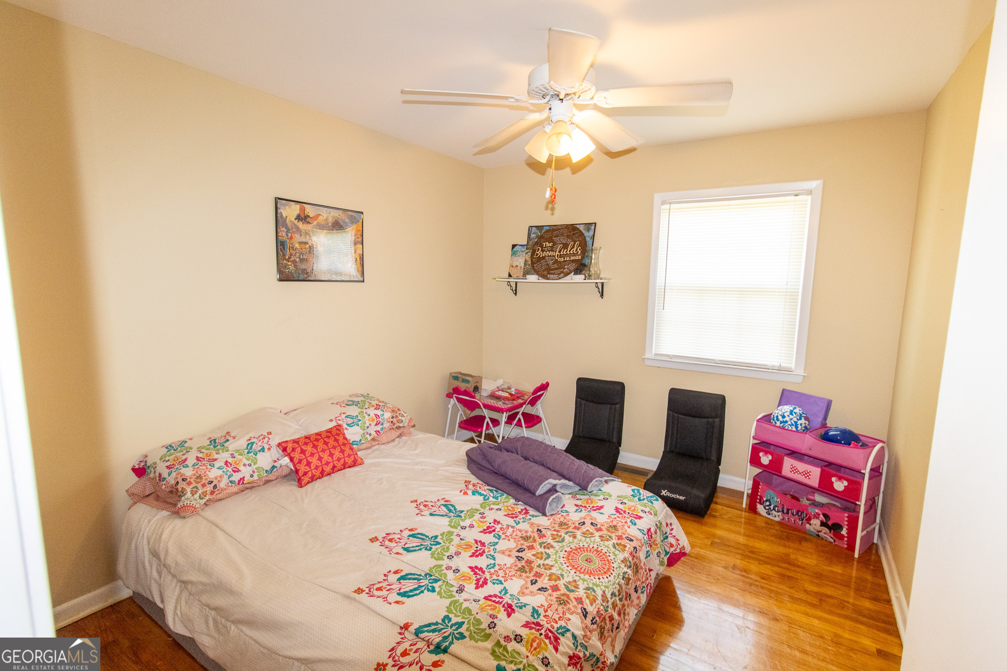 209 Elm Drive Brooklet, GA 30415 - Photo 21 of 30 a bedroom with a bed and a table