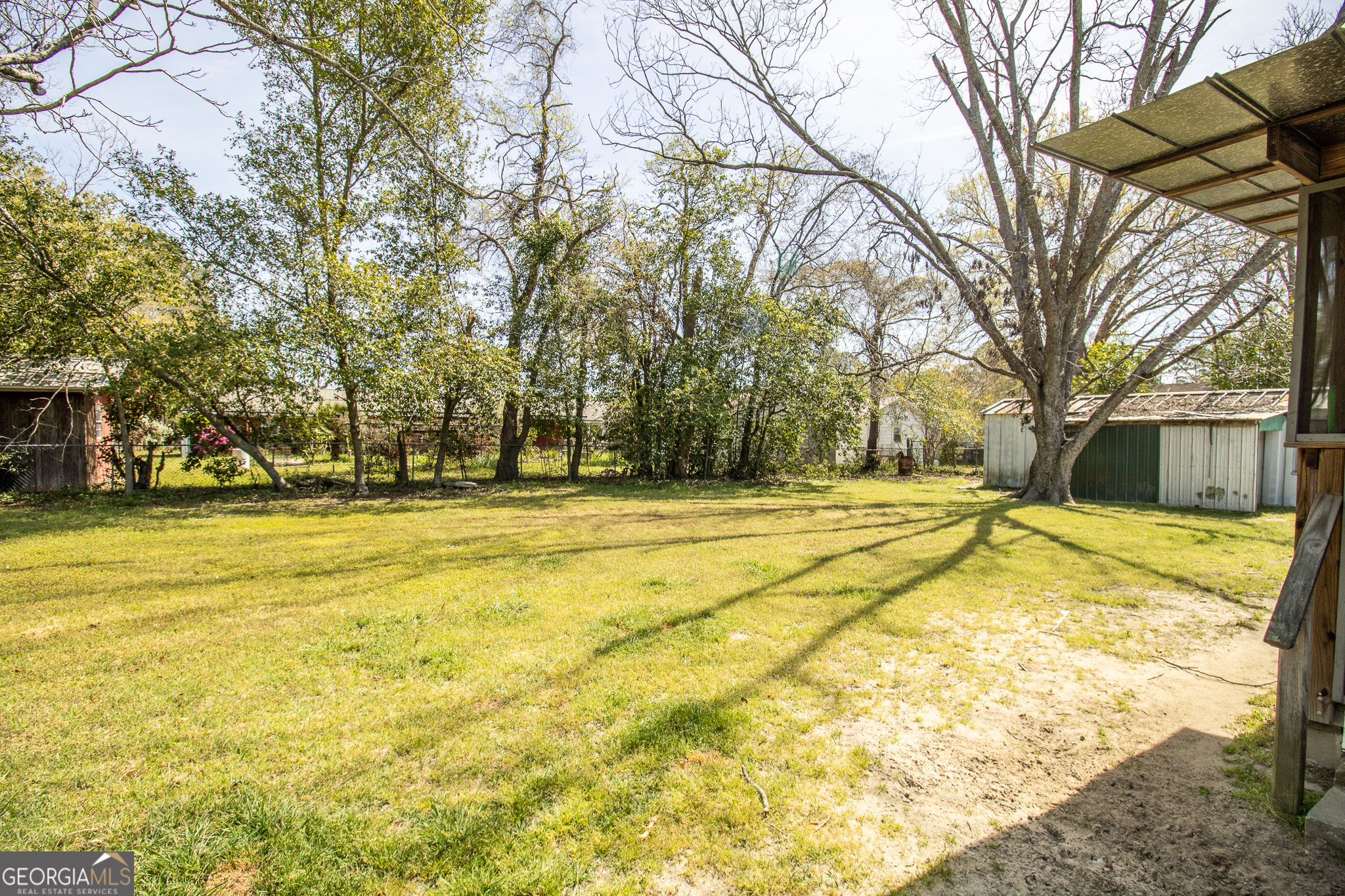 209 Elm Drive Brooklet, GA 30415 - Photo 27 of 30 a view of swimming pool with an outdoor space