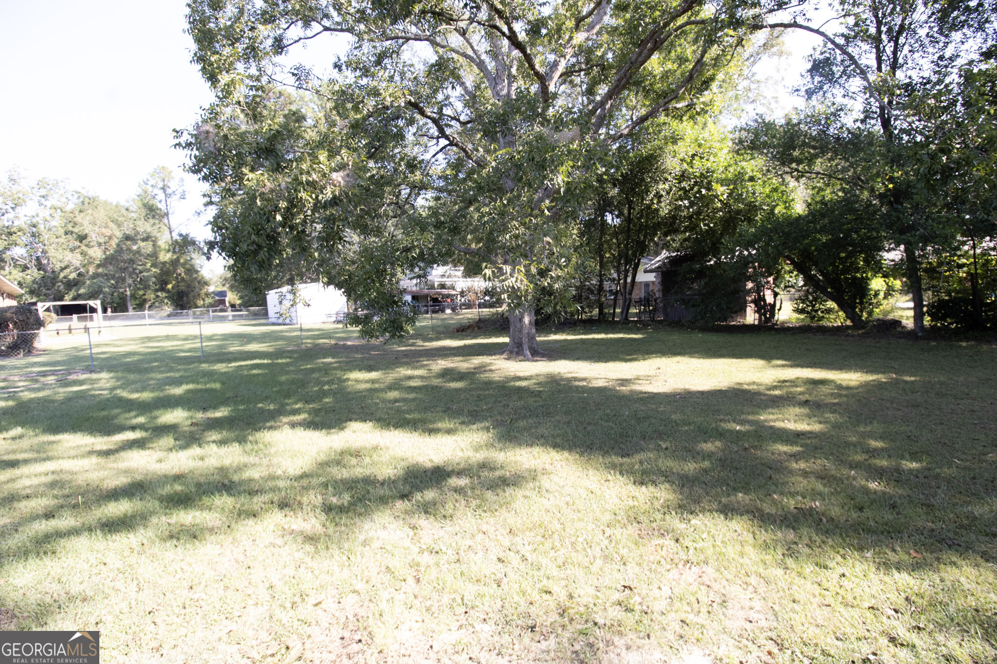 209 Elm Drive Brooklet, GA 30415 - Photo 29 of 30 a view of a trees in a yard