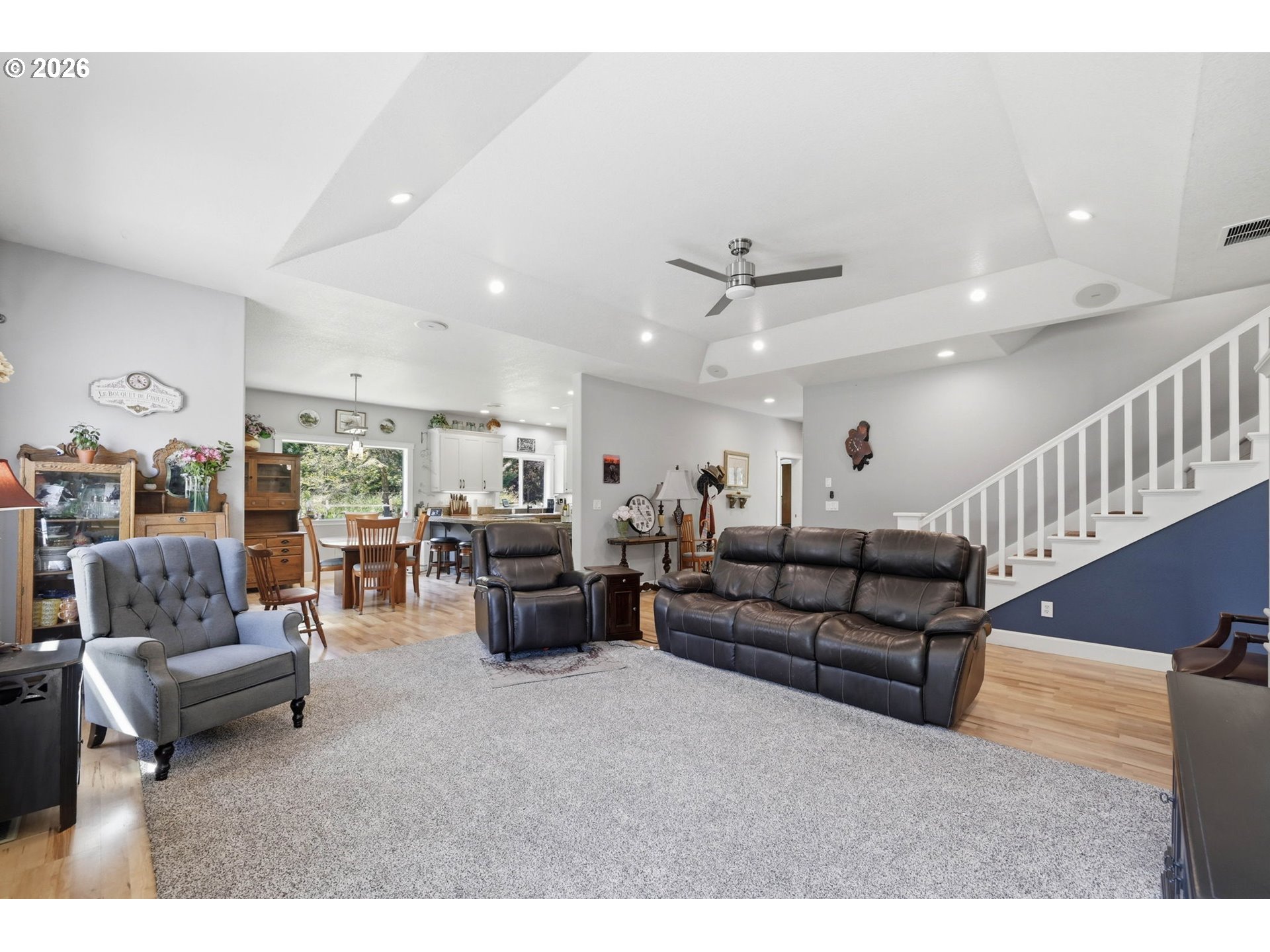 29778 Gimpl Hill Road Eugene, OR 97405 - Photo 10 of 43 a living room with furniture and a ceiling fan