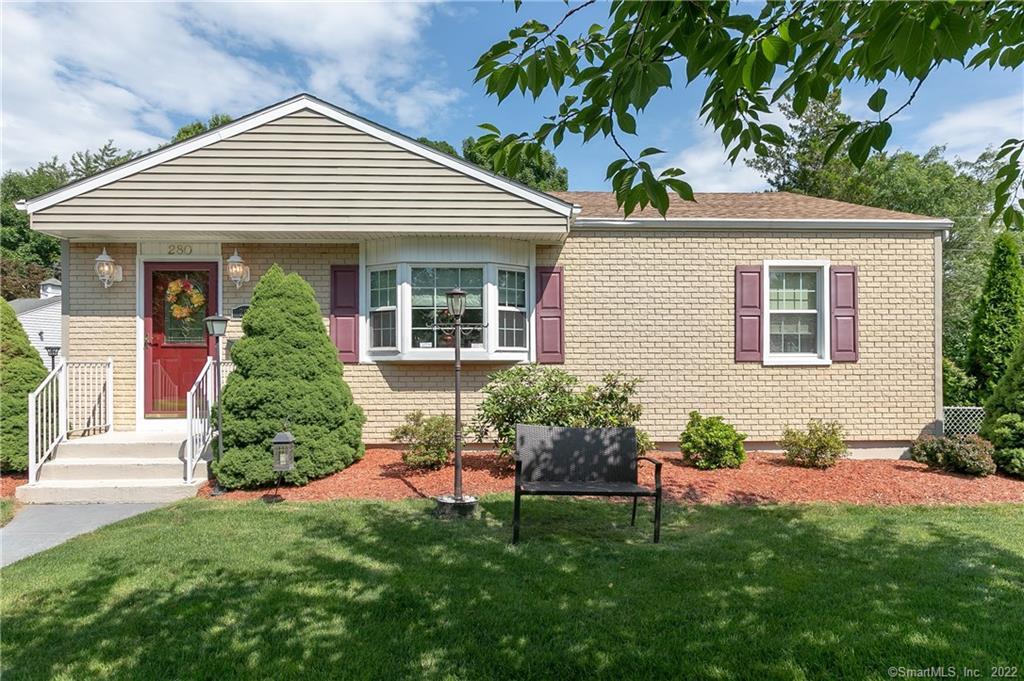 280 Belden Road Hamden, CT 06514 - Photo 1 of 1 a front view of a house with a garden