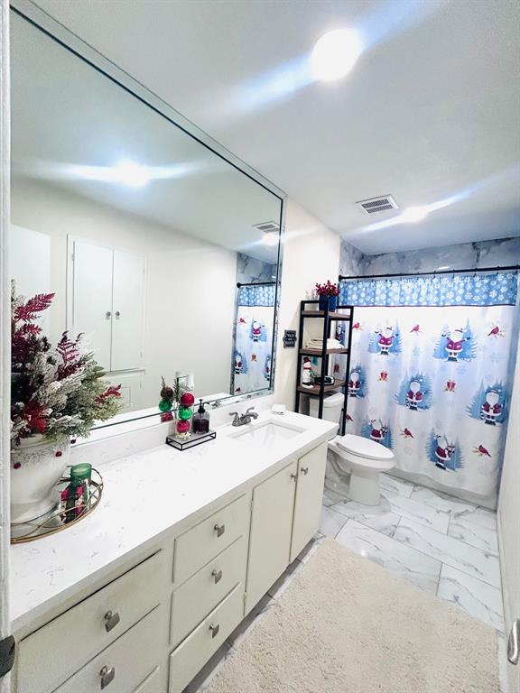 307 East 5th Street Kaufman, TX 75142 - Photo 17 of 27 a view of a room with sink and furniture