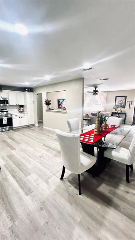 307 East 5th Street Kaufman, TX 75142 - Photo 7 of 27 a bedroom with furniture and a chair