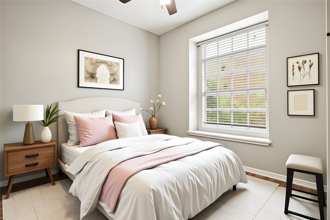 16801 Gravesend Road Pflugerville, TX 78660 - Photo 16 of 30 Virtually staged- Bedroom #3 featuring a textured wall, wood finished floors and a ceiling fan