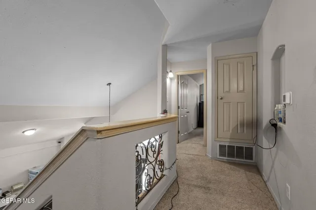 a bathroom with a shower and a sink