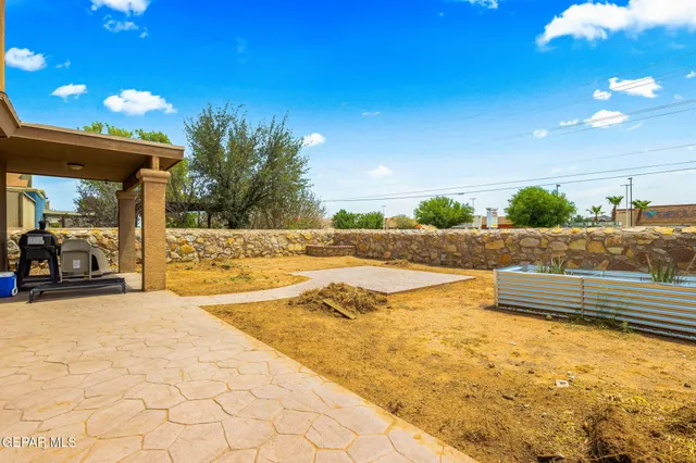 a view of swimming pool with outdoor seating